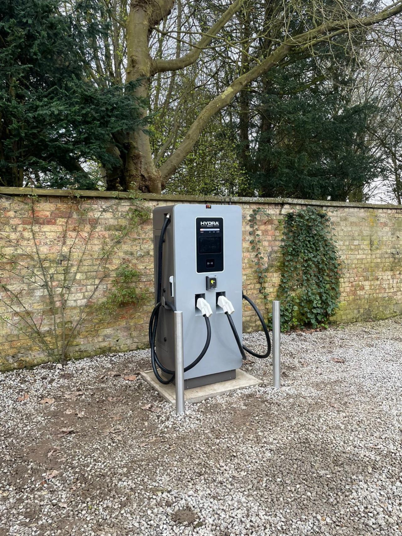 A state-of-the-art 180kW rapid charger situated at a luxury boutique hotel, offering premium charging services for electric vehicles. Designed for discerning guests, this high-powered charge ensures swift and efficient recharging, allowing travellers to seamlessly integrate sustainable transportation into their luxurious experience. The charger's sleek design and advanced technology complements the hotel's upscale ambiance, reinforcing its commitment to eco-conscious hospitality.